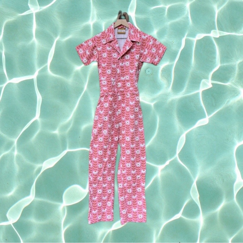 BIG BUD PRESS pink daisy chain jumpsuit in size small.